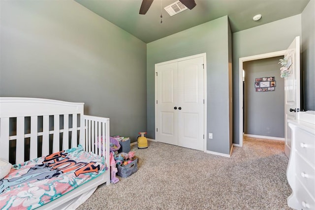 2500 SE 93rd St, Moore, OK 73160 - bedroom with carpet, a closet, and a ceiling fan