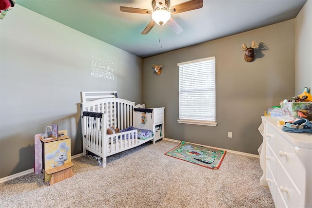 2500 SE 93rd St, Moore, OK 73160 - carpeted bedroom with a crib and ceiling fan