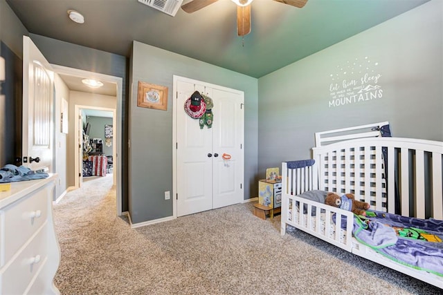 2500 SE 93rd St, Moore, OK 73160 - bedroom featuring carpet flooring, a closet, a ceiling fan, and a nursery area
