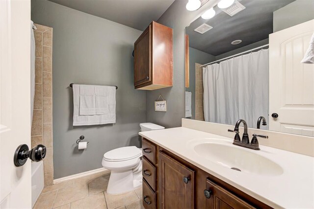 2500 SE 93rd St, Moore, OK 73160 - bathroom featuring vanity, curtained shower, and tile patterned flooring