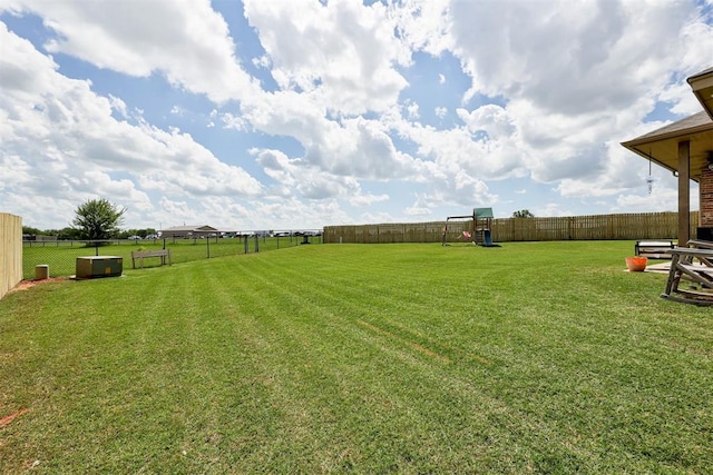 2500 SE 93rd St, Moore, OK 73160 - fenced backyard with a playground