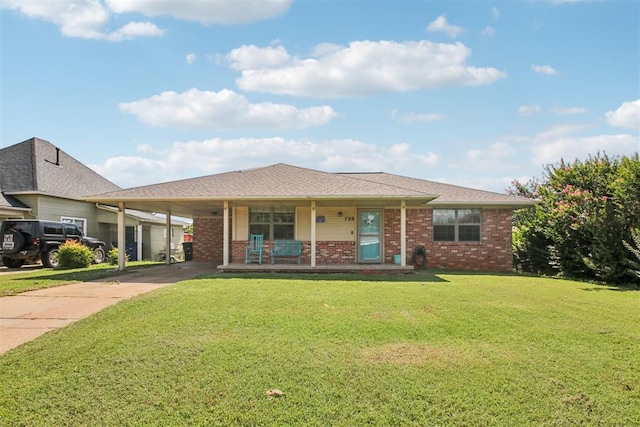 720 N Main St, Blanchard, OK 73010 - ranch-style house featuring covered porch, driveway, a carport, a front lawn, and brick siding