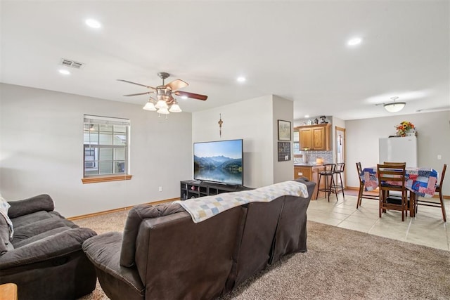 720 N Main St, Blanchard, OK 73010 - living room featuring a ceiling fan, recessed lighting, light tile patterned flooring, and light carpet