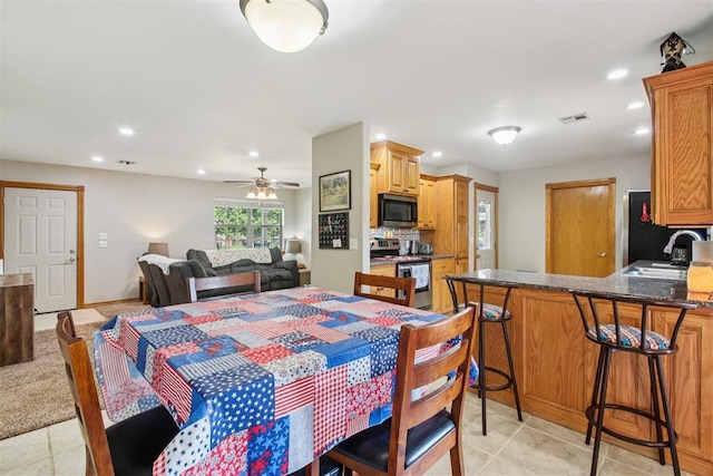 720 N Main St, Blanchard, OK 73010 - dining room with recessed lighting, light tile patterned floors, and ceiling fan