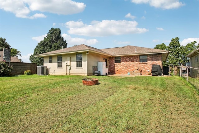 720 N Main St, Blanchard, OK 73010 - back of house with a fenced backyard