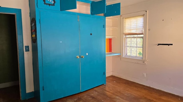 2609 NW 14th St, Oklahoma City, OK 73107 - unfurnished bedroom featuring wood finished floors, elevator, and a closet