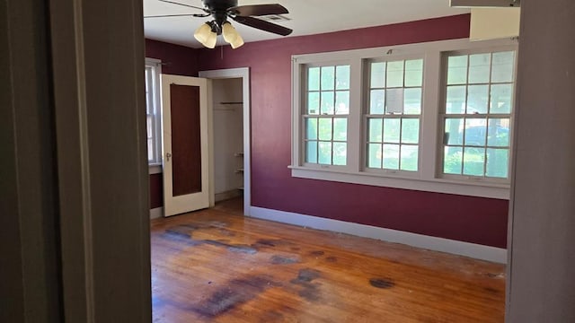 2609 NW 14th St, Oklahoma City, OK 73107 - unfurnished bedroom featuring wood finished floors and ceiling fan