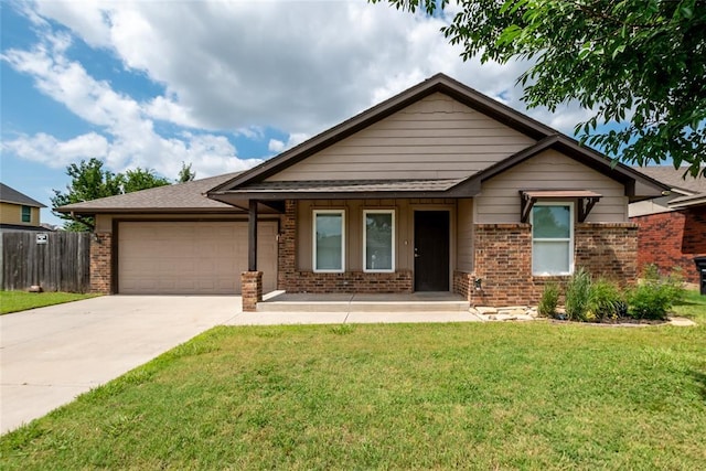 621 SW 7th St, Moore, OK 73160 - view of front facade with brick siding, driveway, a garage, covered porch, and a shingled roof