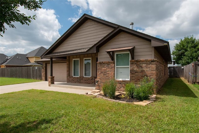 621 SW 7th St, Moore, OK 73160 - view of front facade featuring concrete driveway, a garage, and brick siding