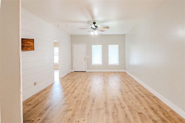 621 SW 7th St, Moore, OK 73160 - spare room with a ceiling fan and light wood-type flooring