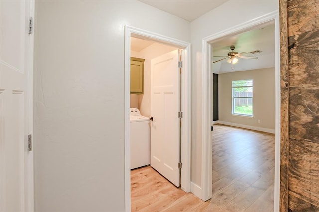 621 SW 7th St, Moore, OK 73160 - hall featuring washer / clothes dryer and light wood-style flooring