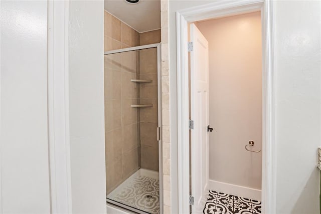 621 SW 7th St, Moore, OK 73160 - full bathroom featuring a shower stall and tile patterned floors