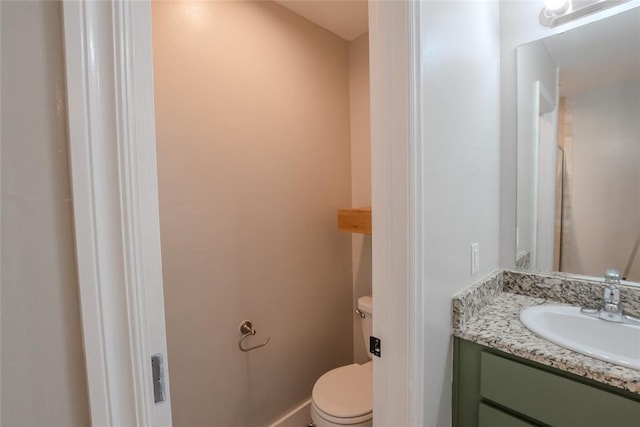 621 SW 7th St, Moore, OK 73160 - bathroom with vanity and toilet