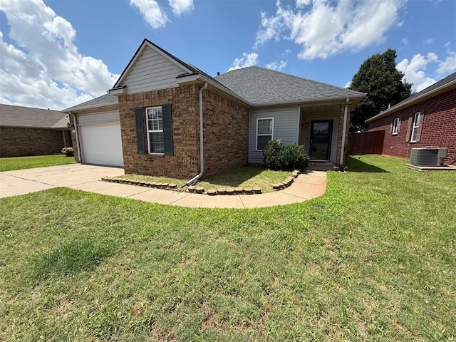 5913 SE 67th St, Oklahoma City, OK 73135 - ranch-style home with brick siding, concrete driveway, an attached garage, and a front lawn