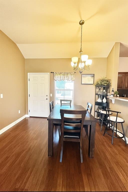 9524 SW 26th St, Oklahoma City, OK 73128 - dining room featuring a chandelier, wood finished floors, and vaulted ceiling