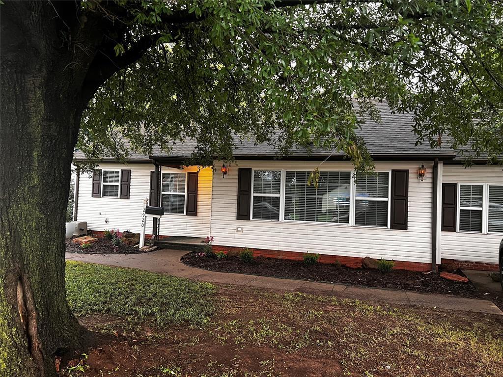 2920 Somerset Pl, Oklahoma City, OK 73116 - view of front of house with a shingled roof