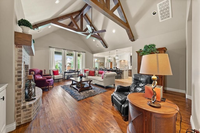 2725 Open Range Rd, Edmond, OK 73034 - living room featuring ceiling fan, high vaulted ceiling, hardwood / wood-style flooring, beamed ceiling, and a brick fireplace