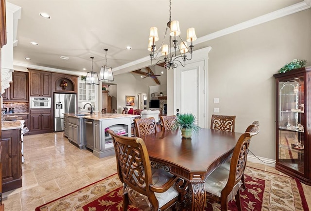 2725 Open Range Rd, Edmond, OK 73034 - dining space with a chandelier, ornamental molding, recessed lighting, and a ceiling fan