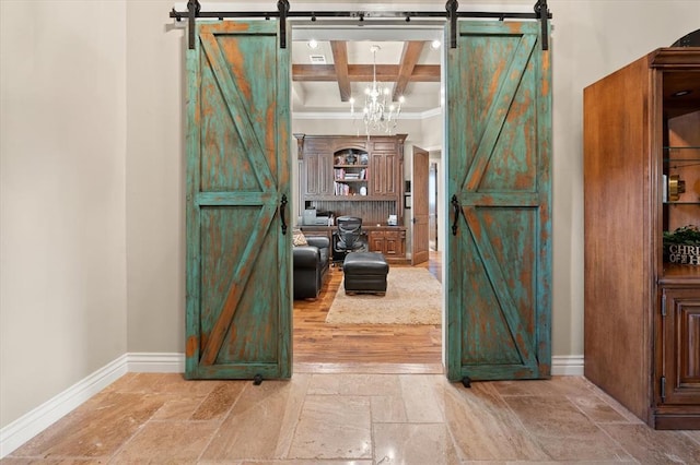 2725 Open Range Rd, Edmond, OK 73034 - corridor featuring a barn door, stone tile flooring, ornamental molding, beam ceiling, and coffered ceiling