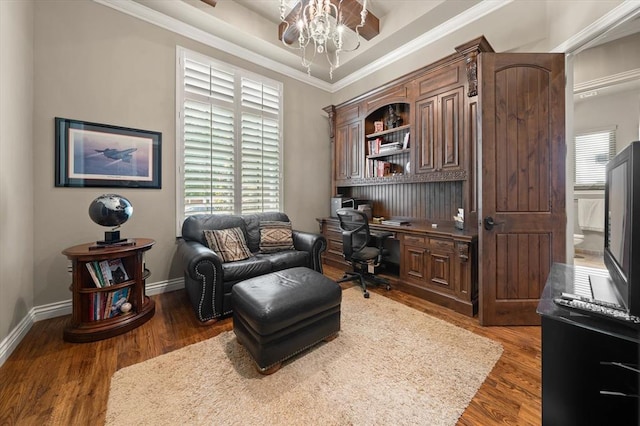 2725 Open Range Rd, Edmond, OK 73034 - office space with wood finished floors, crown molding, and built in study area
