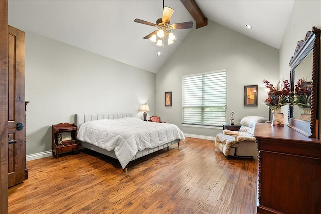 2725 Open Range Rd, Edmond, OK 73034 - bedroom with wood finished floors, high vaulted ceiling, beam ceiling, a ceiling fan, and recessed lighting