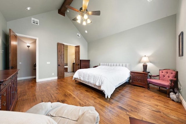 2725 Open Range Rd, Edmond, OK 73034 - bedroom featuring high vaulted ceiling, beam ceiling, wood finished floors, a ceiling fan, and ensuite bathroom