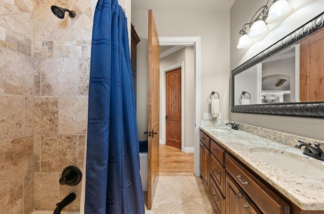 2725 Open Range Rd, Edmond, OK 73034 - full bath with double vanity and shower / bathtub combination with curtain
