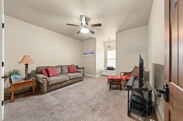 2725 Open Range Rd, Edmond, OK 73034 - living area featuring ceiling fan, carpet flooring, and a chandelier