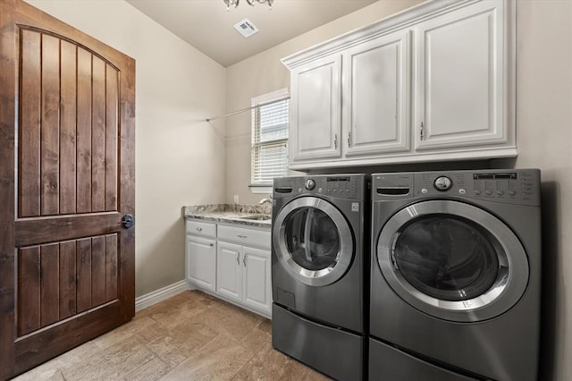 2725 Open Range Rd, Edmond, OK 73034 - washroom featuring cabinet space and washer and dryer