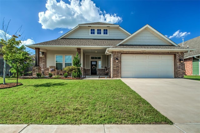 6605 NW 150th Ter, Oklahoma City, OK 73142 - craftsman inspired home with driveway, a garage, covered porch, a front lawn, and brick siding
