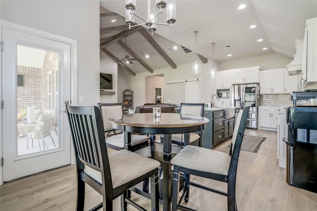 6605 NW 150th Ter, Oklahoma City, OK 73142 - dining space with light wood-type flooring, a ceiling fan, a chandelier, and recessed lighting