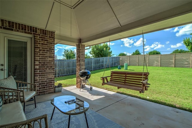 6605 NW 150th Ter, Oklahoma City, OK 73142 - fenced backyard featuring a patio and a grill