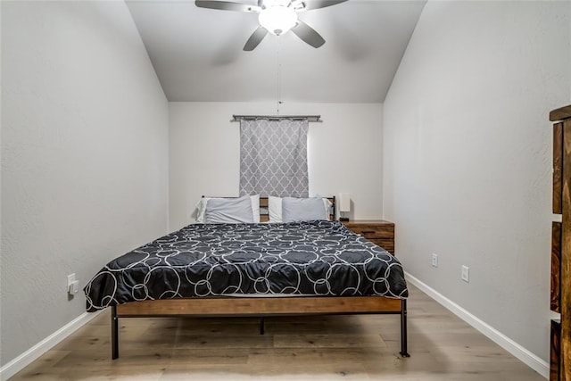 6605 NW 150th Ter, Oklahoma City, OK 73142 - bedroom featuring vaulted ceiling, wood finished floors, and ceiling fan