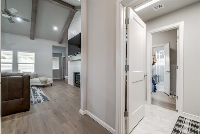 6605 NW 150th Ter, Oklahoma City, OK 73142 - corridor with baseboards and light wood finished floors