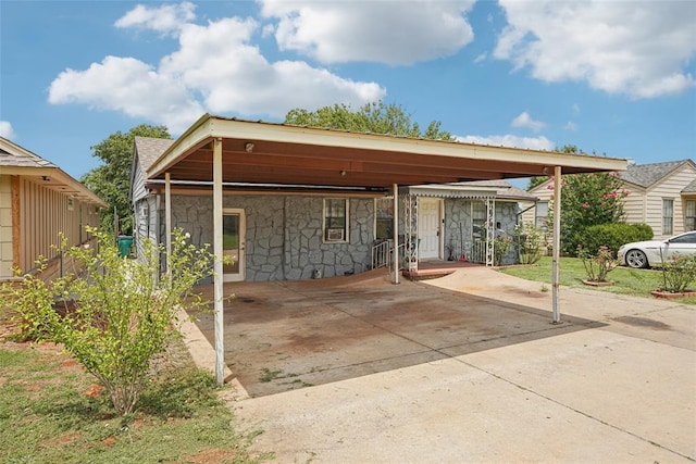 329 SE 58th St, Oklahoma City, OK 73129 - view of front of property featuring stone siding and concrete driveway