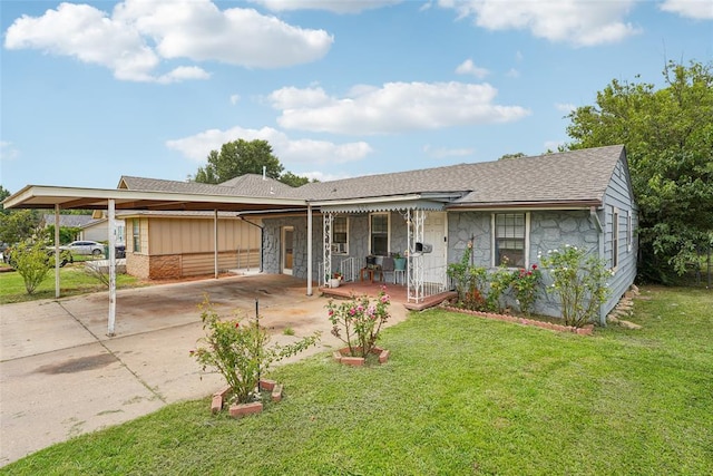 329 SE 58th St, Oklahoma City, OK 73129 - view of front of house with stone siding, an attached carport, a front yard, roof with shingles, and covered porch