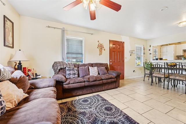 329 SE 58th St, Oklahoma City, OK 73129 - living room with ceiling fan and light tile patterned floors