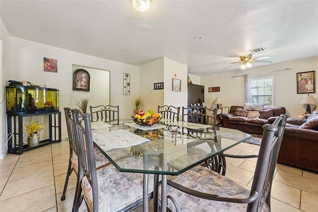 329 SE 58th St, Oklahoma City, OK 73129 - dining room featuring ceiling fan and light tile patterned flooring
