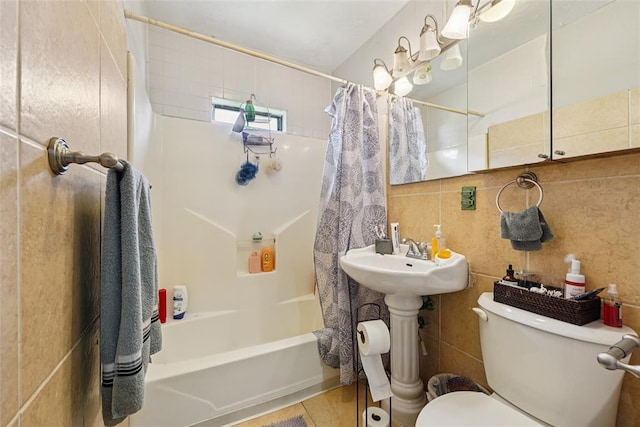 329 SE 58th St, Oklahoma City, OK 73129 - bathroom featuring shower / bath combo, tile walls, decorative backsplash, and tile patterned flooring