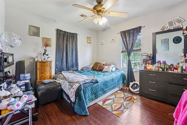 329 SE 58th St, Oklahoma City, OK 73129 - bedroom featuring wood finished floors and ceiling fan