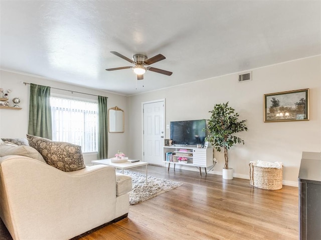 5409 N Walker Ave, Oklahoma City, OK 73118 - living room featuring ceiling fan and wood finished floors