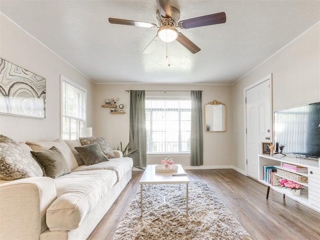 5409 N Walker Ave, Oklahoma City, OK 73118 - living room with wood finished floors, crown molding, and ceiling fan