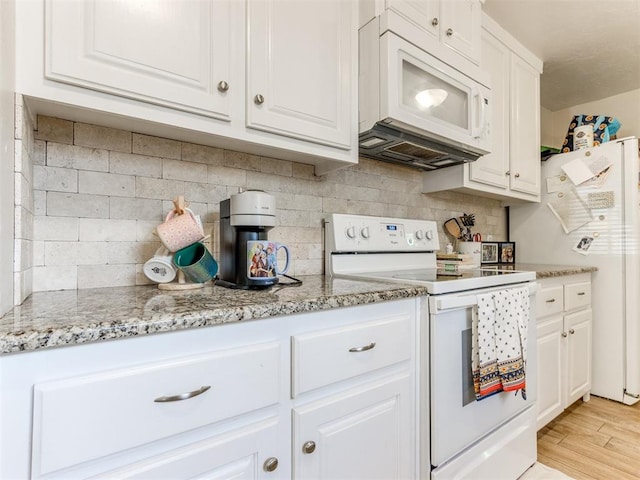 5409 N Walker Ave, Oklahoma City, OK 73118 - kitchen with white appliances, white cabinets, decorative backsplash, and light wood-style flooring