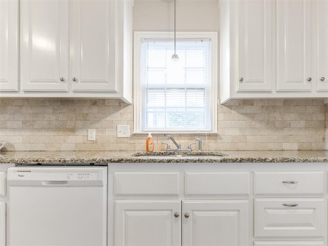 5409 N Walker Ave, Oklahoma City, OK 73118 - kitchen with white dishwasher, white cabinetry, tasteful backsplash, and light stone countertops