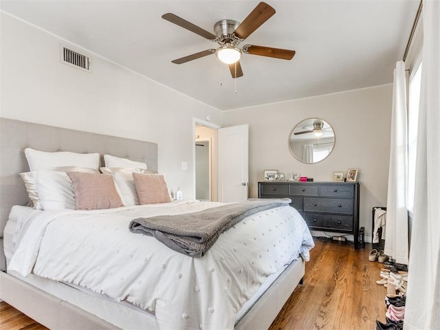 5409 N Walker Ave, Oklahoma City, OK 73118 - bedroom with wood finished floors and ceiling fan
