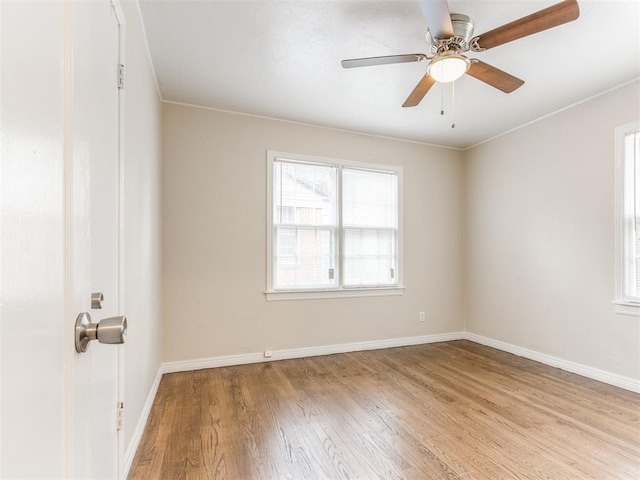 5409 N Walker Ave, Oklahoma City, OK 73118 - spare room featuring wood finished floors, ceiling fan, and ornamental molding