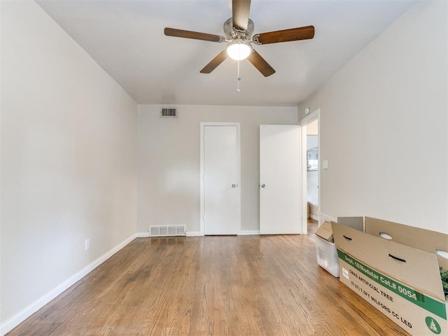 5409 N Walker Ave, Oklahoma City, OK 73118 - unfurnished room featuring ceiling fan and wood finished floors