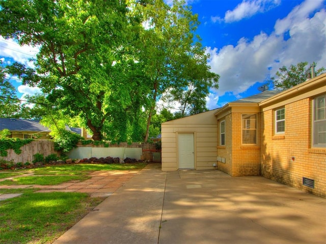 5409 N Walker Ave, Oklahoma City, OK 73118 - view of yard with a patio