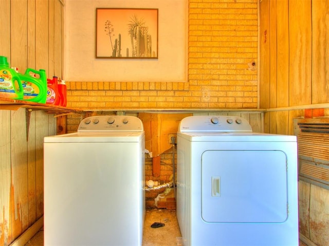 5409 N Walker Ave, Oklahoma City, OK 73118 - laundry area with independent washer and dryer and wood walls