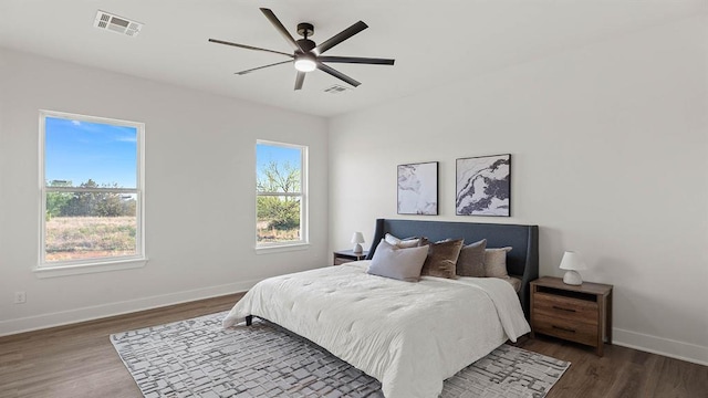 4676 Ranchero Dr, Edmond, OK 73025 - bedroom featuring wood finished floors and ceiling fan